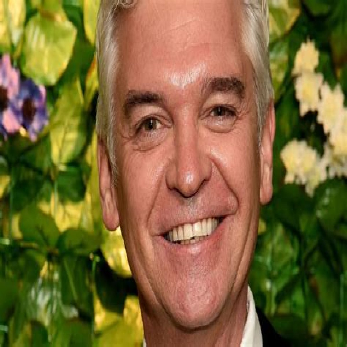 Phillip Schofield bares all in cheeky gardening photo